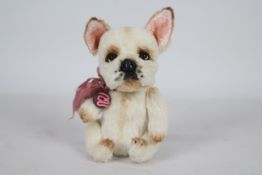 Unknown Maker - A French Bull Dog with glass eyes, plastic nose, and pink ears.