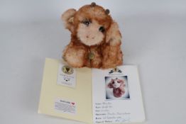 Devine Bears - A handmade one of a kind artist bear called Munchkin made by Amy Gaston at Devine