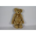 Unknown Maker - A traditional jointed hand made golden teddy bear called Bertie Boots,