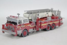 Code 3 Collectibles - An unboxed Mack/Baker 75 foot Ladder in FDNY livery in 1:64 scale. # 13037.
