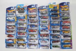 Hot Wheels - 50 x unopened carded models from the early 2000s including Bugatti Veyron # 56392,