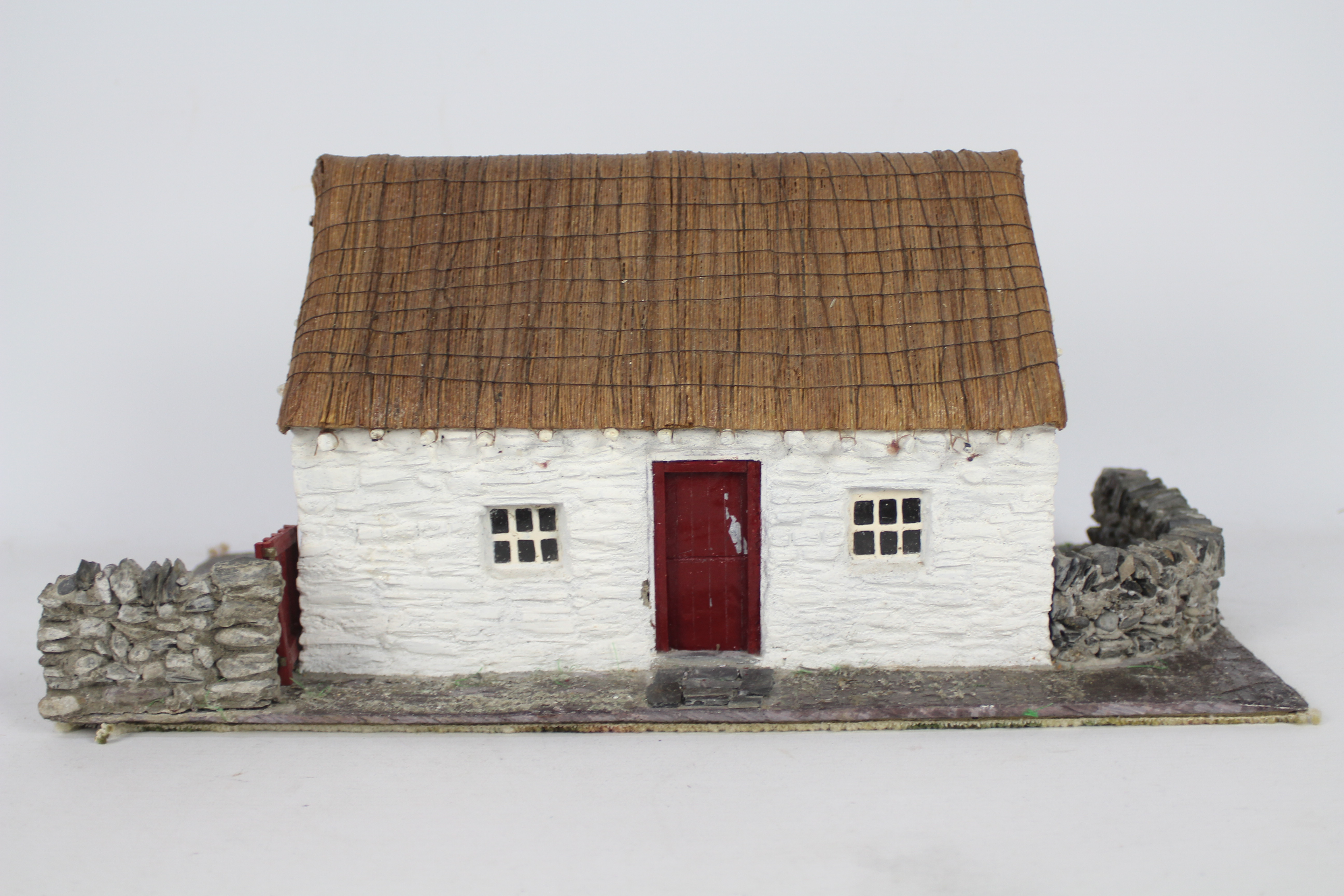 Unconfirmed Maker - An interesting and well constructed model of a thatched stone cottage,