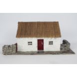 Unconfirmed Maker - An interesting and well constructed model of a thatched stone cottage,