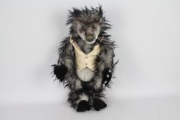 Unknown Maker - A large fully jointed Wild Boar soft toy with glass eyes and a hard resin nose.