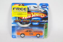 Hot Wheels - Treasure Hunt - A sought after unopened 1969 Dodge Charger # J3287 from 2006 # 7 of 12.