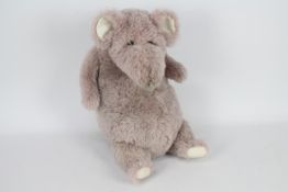 Unknown Maker - A large fully jointed rat soft toy in pale pink with glass eyes, felt pads and ears.