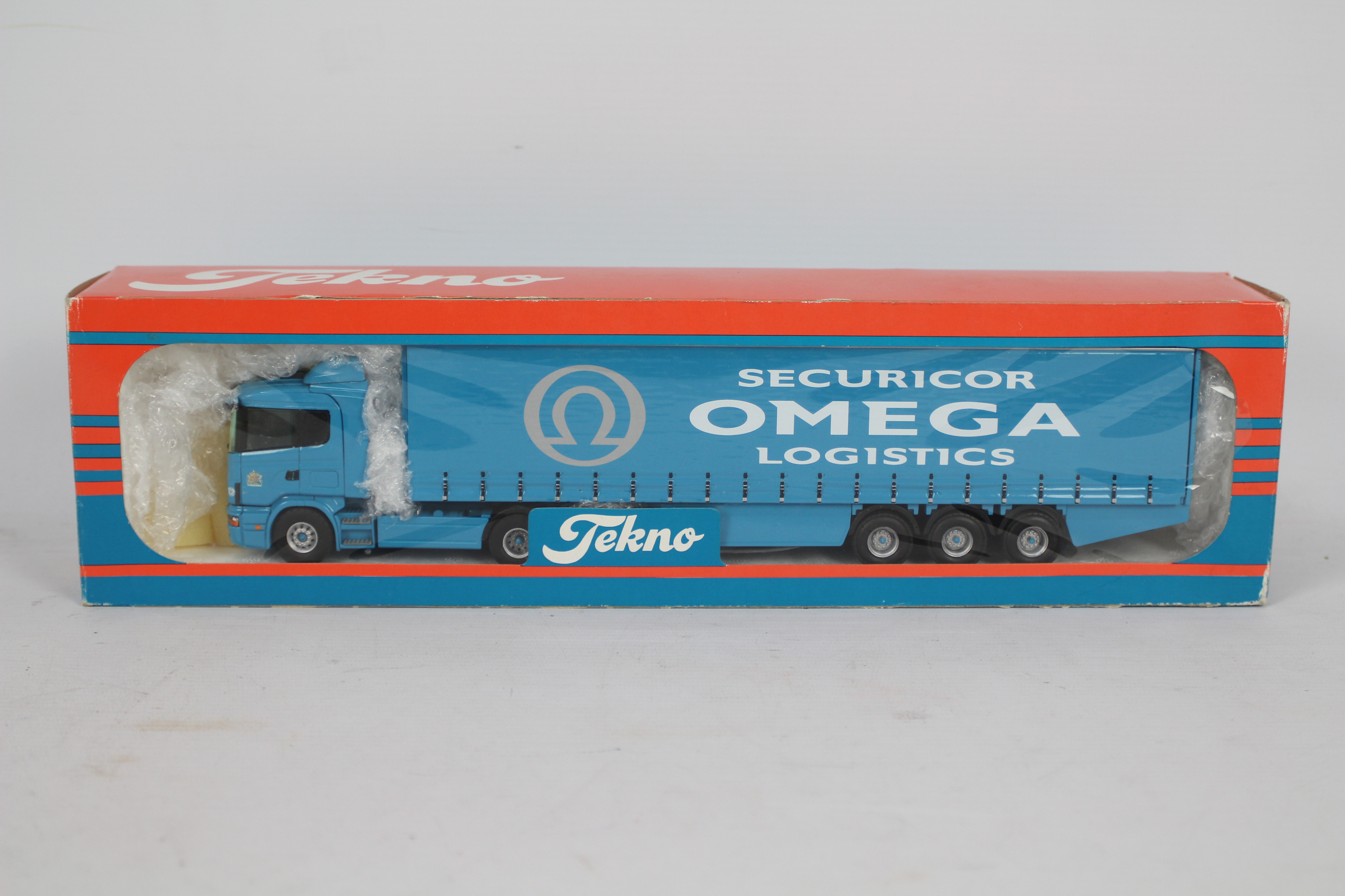 Tekno - A boxed Tekno #66 'The British Collection' 1:50 scale diecast Scania Curtainside 'Omega'.