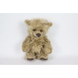 Melisa's Bears - A one of a kind golden faux fur bear named Lizzie made by the Canadian company