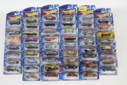 Hot Wheels - 50 x unopened models from circa 2000 including Custom Cadillac 1959 # 52907,