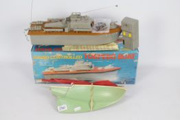 Telsalda, Scalex - Two vintage plastic toy boats.