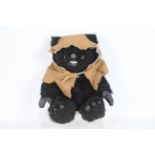 Star Wars - A black plush Ewok teddy which stands approximately 40 cm tall.