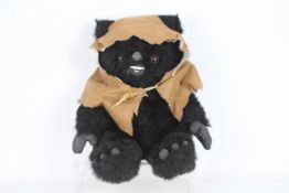 Star Wars - A black plush Ewok teddy which stands approximately 40 cm tall.