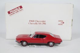 Danbury Mint - A boxed 1:24 scale 1968 Chevrolet Chevelle SS-396 by Danbury Mint.