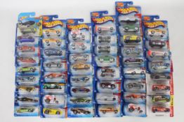 Hot Wheels - 50 x unopened carded models from the 2000s including many from the Hot 100 series,