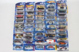 Hot Wheels - 50 x unopened carded models from the 2000s including Austin Healey # 53710,