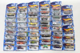 Hot Wheels - 50 x unopened carded models from circa 2000 including Baja Bug # 55092,