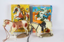 Marx - Two boxed vintage Marx 'The Lone Ranger Rides Again' horses, 'Silver' and 'Scout'.