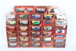 Matchbox Models of Yesteryear - 34 boxed Matchbox MOYs in red boxes.