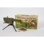 Benbros - A rare boxed Benbros Qualitoy Quick Firing Machine Gun On Tripod.