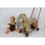 Triang, Other - An unboxed and unmarked vintage child mannequin doll with a Triang Push-Along-Dog.