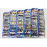 Hot Wheels - 50 x unopened carded models from the 2000s including Ford Focus # 55069,