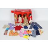 Palitoy - Pippa Doll - 4 x vintage Pippa Dolls in a wardrobe carry case with a selection of clothes.