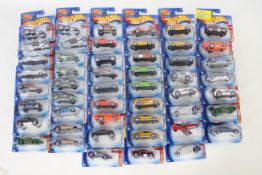 Hot Wheels - 50 x unopened carded models from the early 2000s including the Hot 100 series,