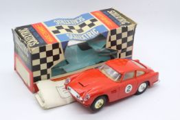 Scalextric - A boxed vintage Aston Martin DB4 GT in red # C68.