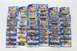 Hot Wheels - 50 x unopened carded models mostly from the late 90s / early 00s including Baja Bug #