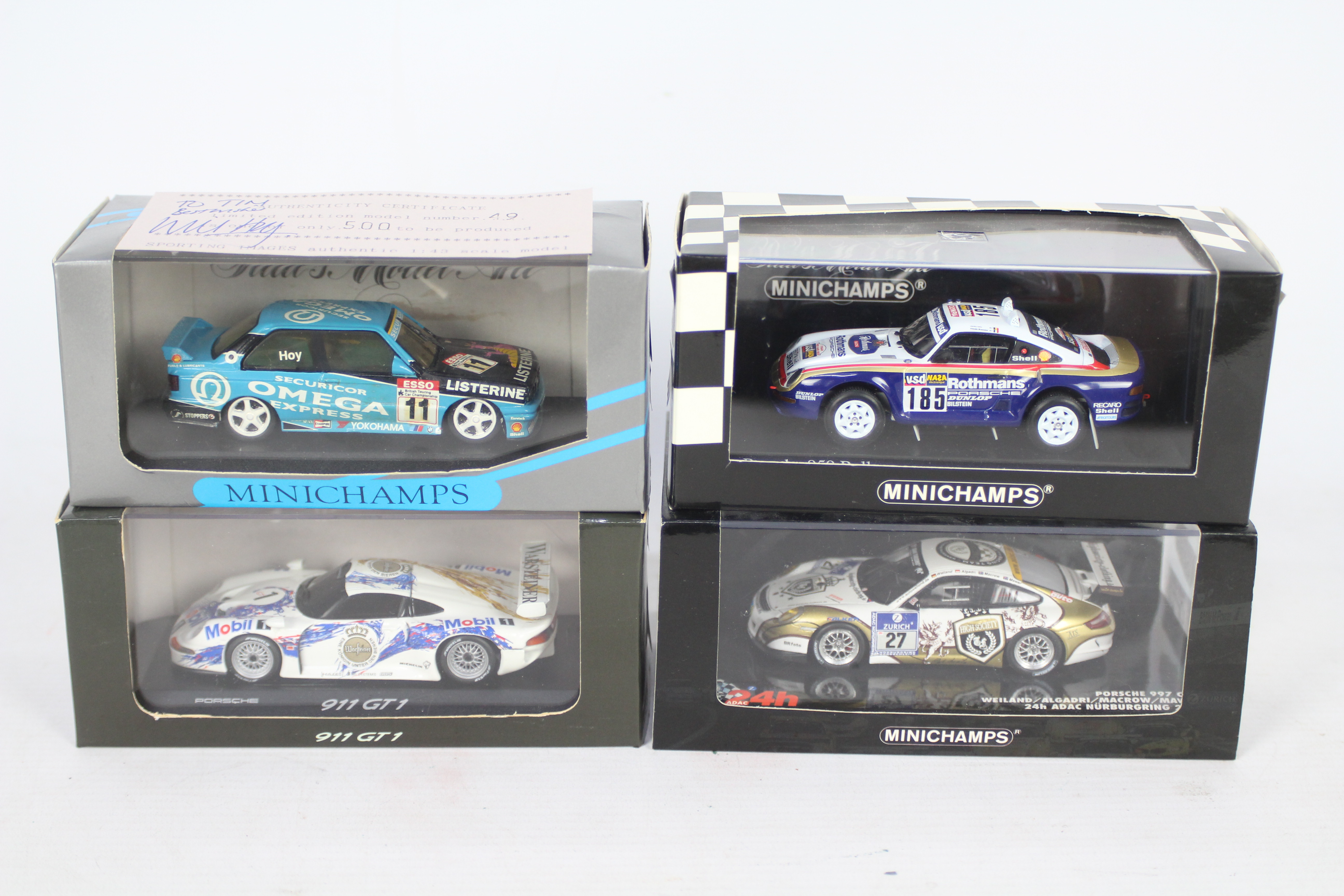 Minichamps - Four boxed 1:43 scale model sports cars from Minichamps.