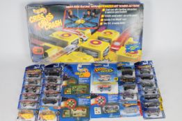 Hot Wheels - 28 x unopened carded models and a boxed Criss Cross Crash Track set # 7996,