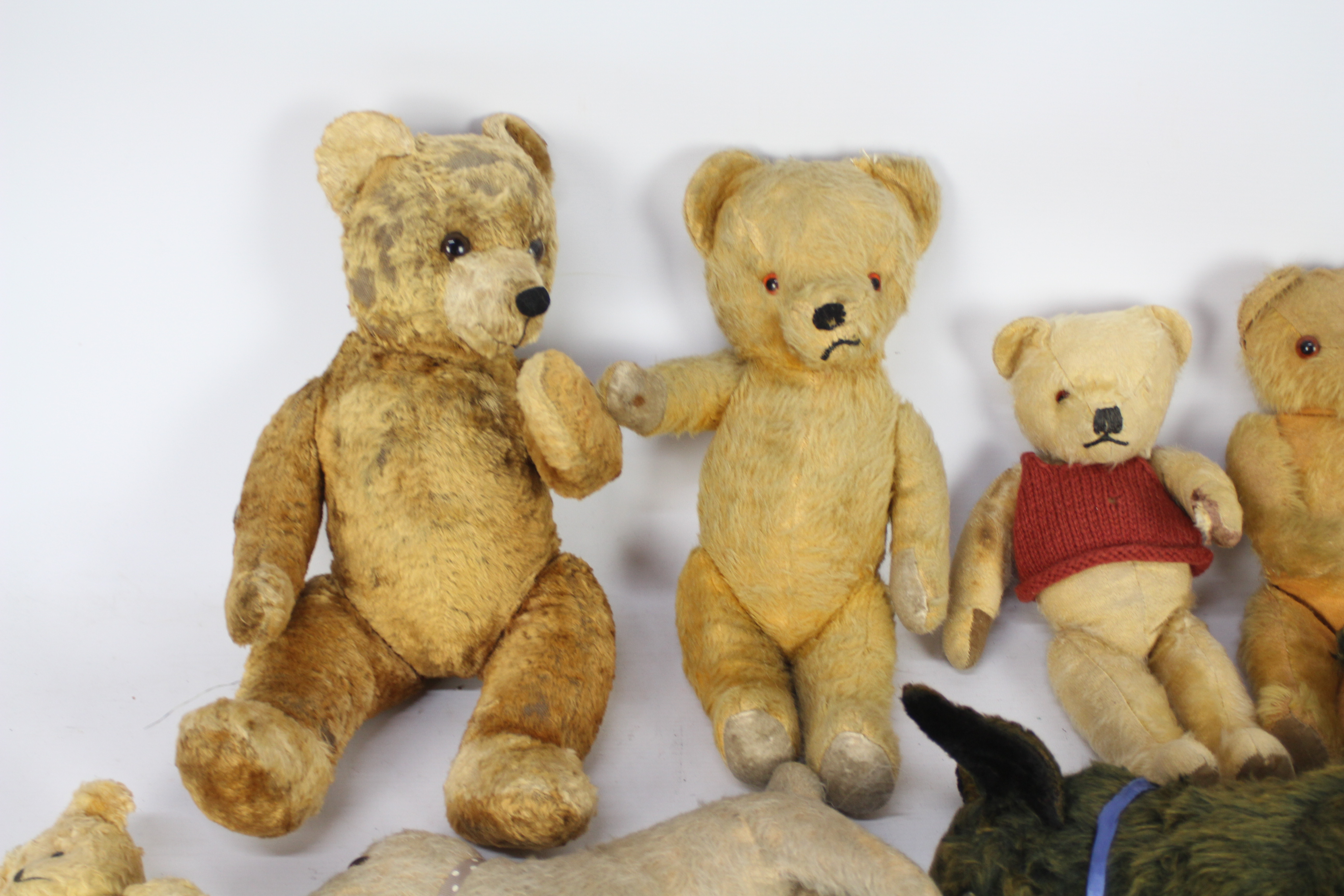 A collection of vintage unmarked teddy bears. - Image 2 of 5