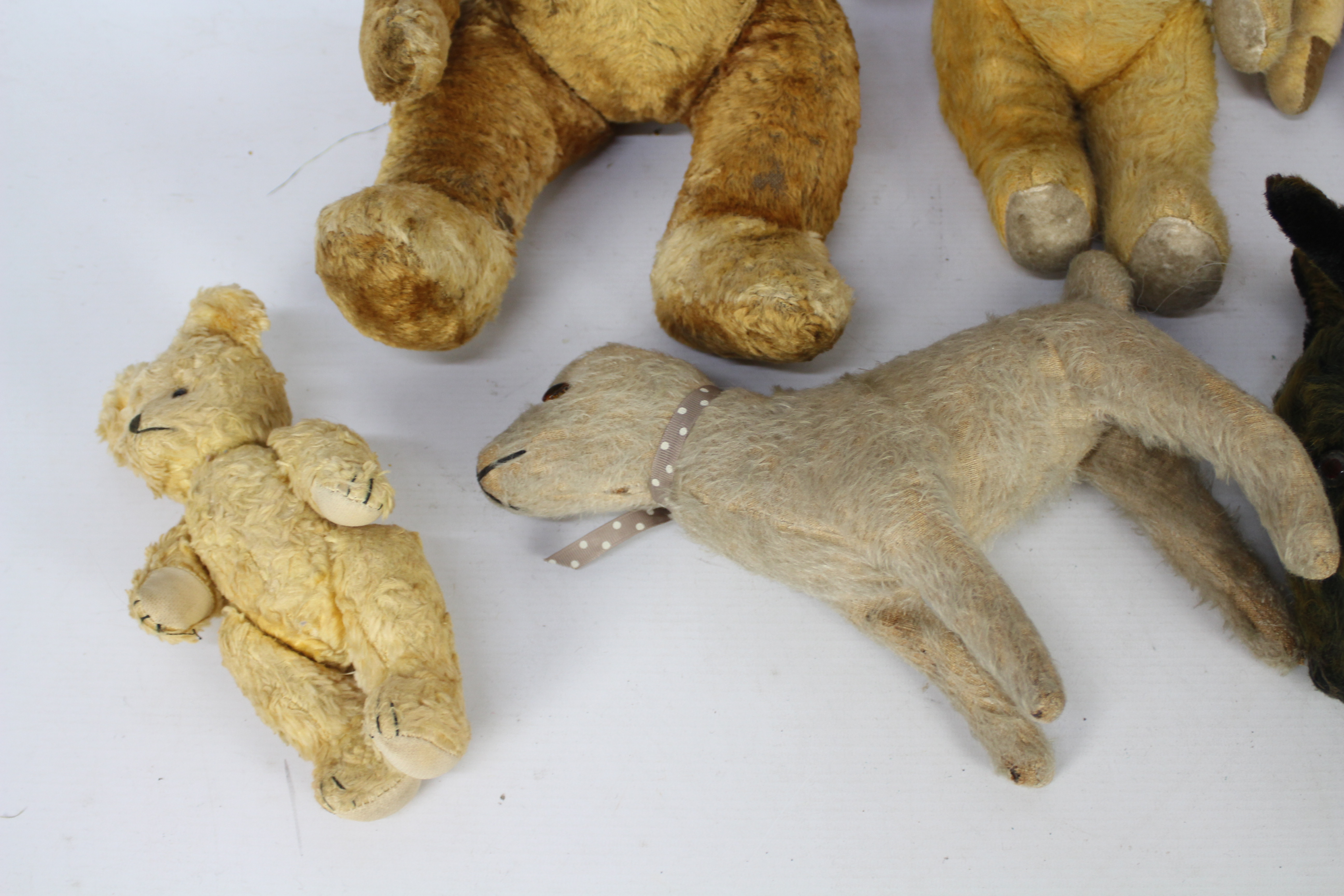 A collection of vintage unmarked teddy bears. - Image 4 of 5