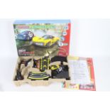 Scalextric - Micro Scalextric - A boxed Hot Pursuit set with Police SUV and a Rasio C-20.