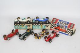 WITHDRAWN - Scalextric - 7 x vintage models, a boxed Cooper F1 # C81, a boxed Lotus # C82,