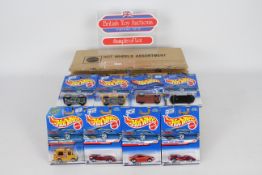 Hot Wheels - A Hot Wheels factory assortment box of 72 x models from circa 2000,