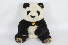 Steiff - A Steiff #064821 'Manscli' plush Panda Bear approx 36 cms in height,