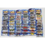 Hot Wheels - 50 x unopened carded models mostly form the 1990s including Camaro Z28 # 26021,