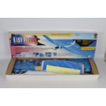 A boxed remote control "Easy pigeon" airplane.