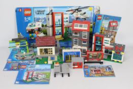 Lego - A collection of Lego Buildings including # 7848 Toys R us shop, # 60026 Pizza shop,