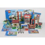 Lego - A collection of Lego Buildings including # 7848 Toys R us shop, # 60026 Pizza shop,