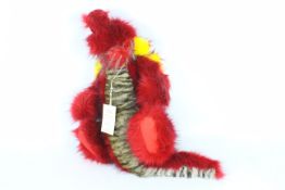 Wendy Woo Creations - A faux fur soft toy dragon with glass eyes and stitched nose.
