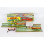 Hec - Agrawal - A boxed tin plate clockwork Local Shuttle Train with a two part track with Deli