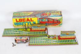 Hec - Agrawal - A boxed tin plate clockwork Local Shuttle Train with a two part track with Deli