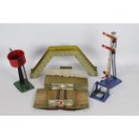 Hornby - A collection of 0 gauge track side items, a level crossing, water tower, foot bridge,