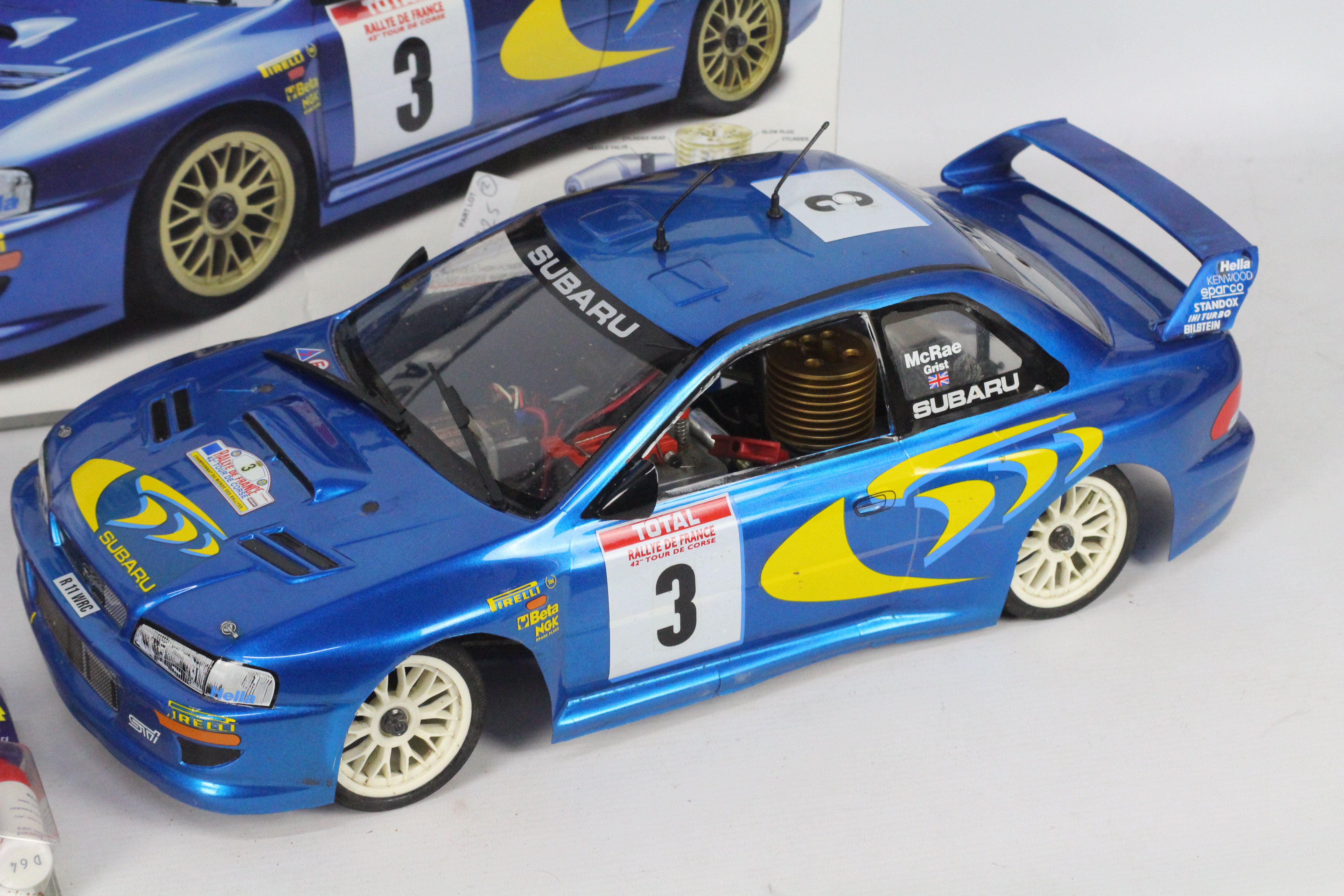 A R/C petrol 1:10 scale 4 WD Subaru Impreza WRC with controller and original box with decals and - Image 2 of 5