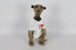 Teslatop Bears - A meerkat with glass eyes, and padded paws.