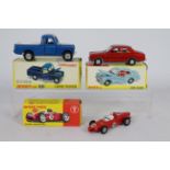 Dinky - 3 x boxed models, # 168 Ford Escort in metallic red, # 242 Ferrari Racing Car,