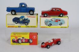 Dinky - 3 x boxed models, # 168 Ford Escort in metallic red, # 242 Ferrari Racing Car,