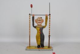 Arnold - A vintage acrobatic Clown called Jimmy made in West Germany by Arnold Toys.
